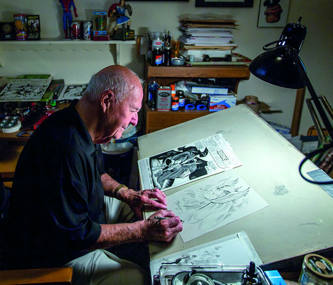 Joe Sinnott at his drawing board